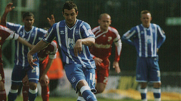Gary Dicker scores a penalty for Brighton and Hove Albion against Swindon Town in March 2011