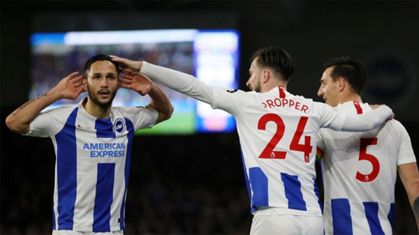 Florin Andone celebrates as Brighton beat Crystal Palace 3-1 despite playing for over an hour with 10 men