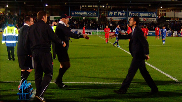 Russell Slade shakes the hand of Gus Poyet as Leyton Orient take on Brighton at Withdean Stadium in the EFL Trophy