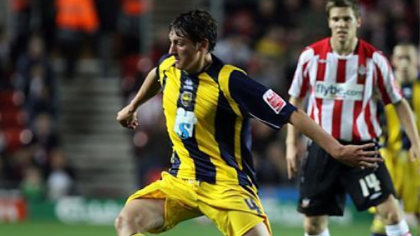 Tommy Elphick playing for Brighton in the 2009-10 season
