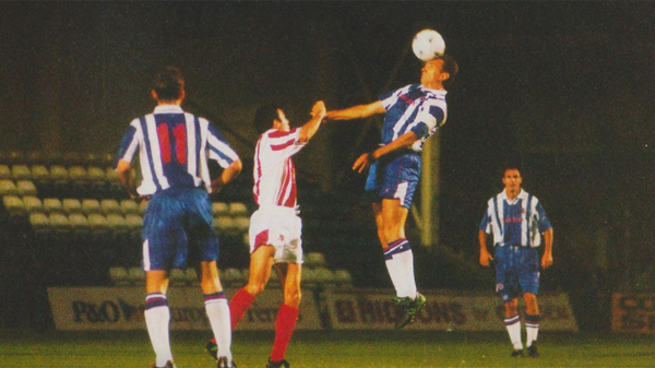 Mark Morris goes up for a header as Brighton lose 1-0 to Lincoln City in the 1997-98 season