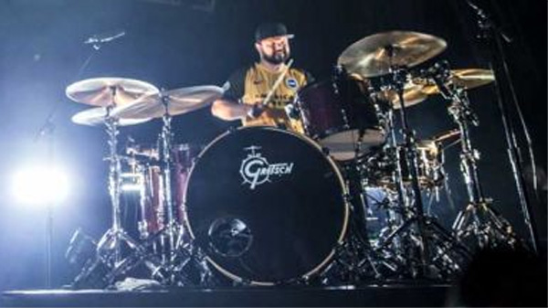 Royal Blood drummer Ben Thatcher inadvertently revealed the new Brighton away football kit for the 2017-18 season on stage in Sydney