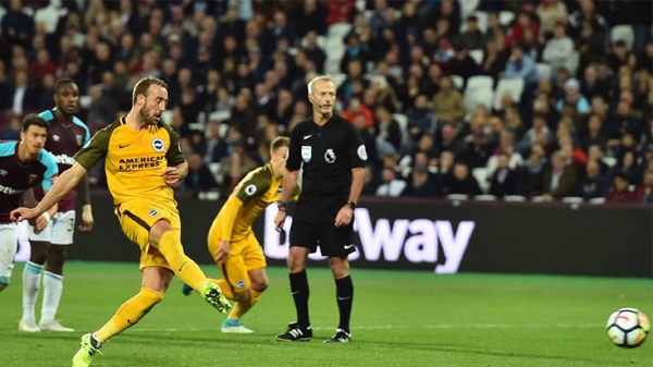 Glenn Murray scores a penalty past Joe Hart as Brighton win 3-0 at the London Stadium
