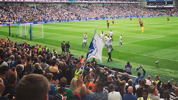 Brighton's players celebrate scoring against Manchester United at the Amex in August 2018