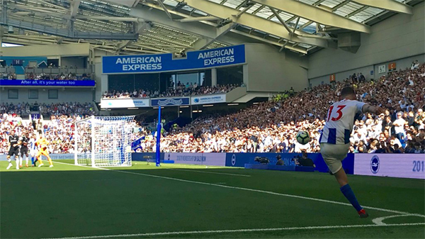 Pascal Gross takes a corner for Brighton against Fulham