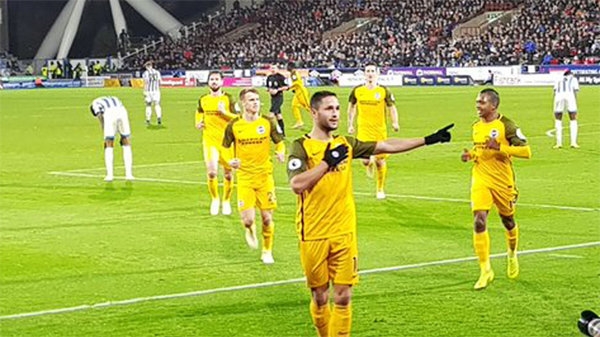 Florin Andone celebrates scoring for Brighton against Huddersfield Town in December 2018