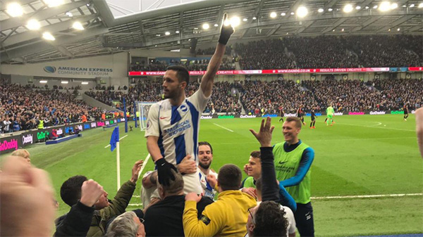 Florin Andone celebrates scoring Brighton's winner against Huddersfield Town