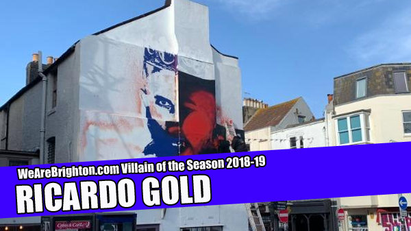 Ricardo Gold paints over the Bruno mural in the centre of Brighton to promote a new album