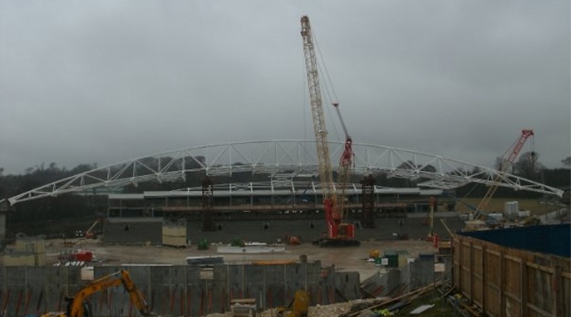 The building of the Amex Stadium continued in February 2010 with the East Stand arch now completely raised into place
