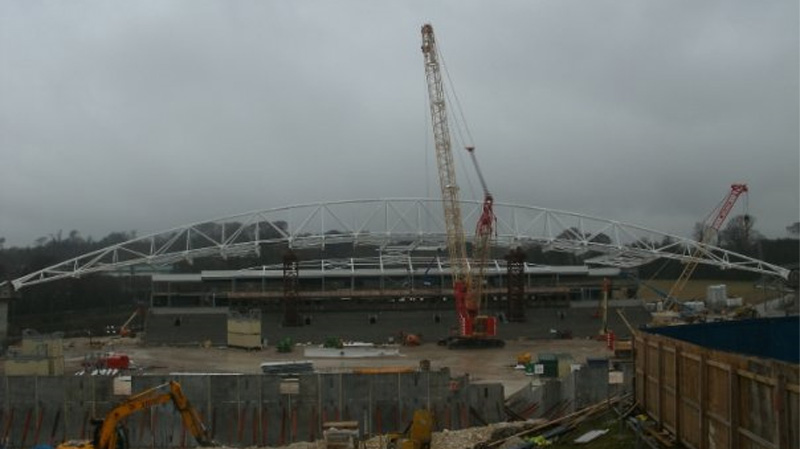 The building of the Amex Stadium continued in February 2010 with the East Stand arch now completely raised into place