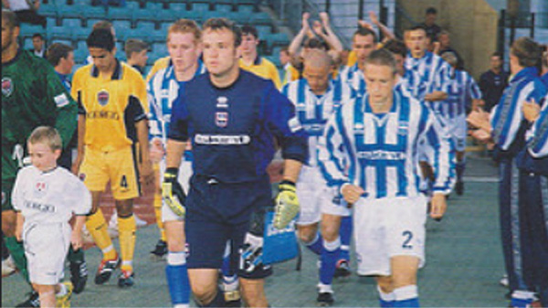 Mark Cartwright wearing Brighton & Hove Albion's dark blue goalkeeper shirt in the 200-01 season, one of the best campaigns the club ever had
