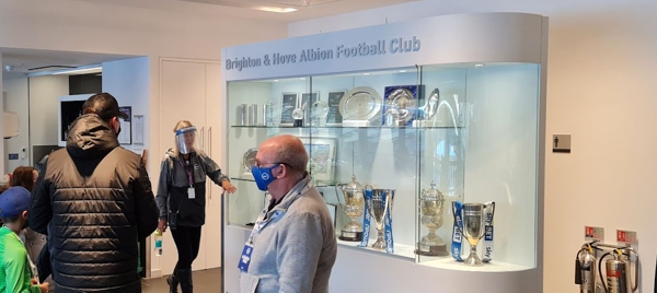 The Amex Stadium tour includes seeing the Brighton trophy cabinet in the directors' lounge