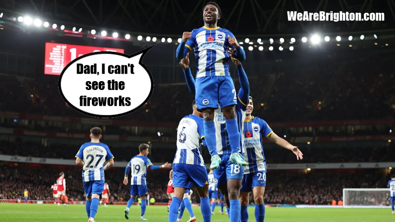 Tariq Lamptey and Danny Welbeck celebrate an Albion goal during Arsenal -3 Brighton at the Emirates Stadium