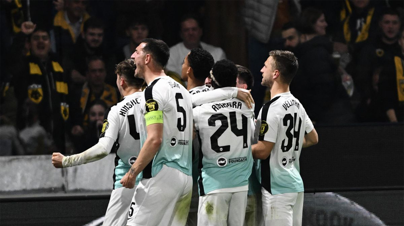 Joao Pedro and this Albion teammates celebrate the only goal of the game in AEK Athens 0-1 Brighton