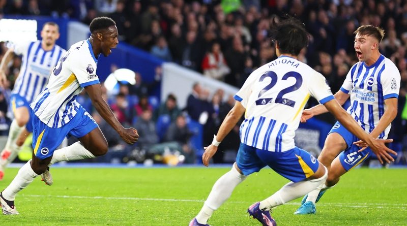 Danny Welbeck celebrates scoring the winning goal in a chaotic 3-2 win for Brighton over Spurs