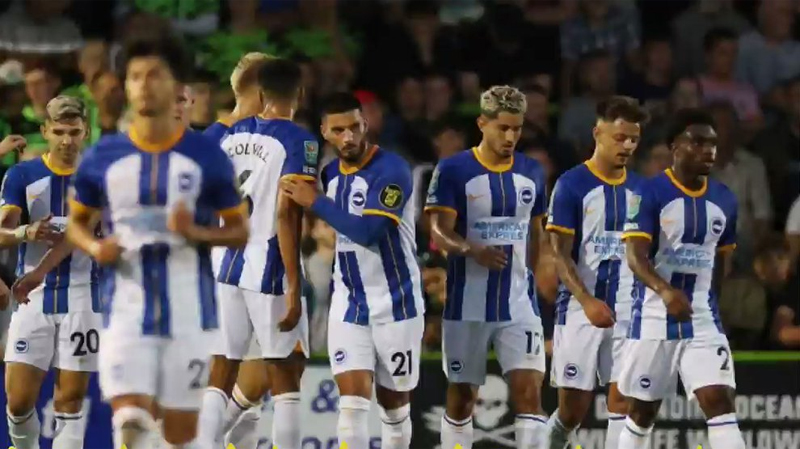 Brighton players celebrate their 3-0 League Cup win at Forest Green Rovers