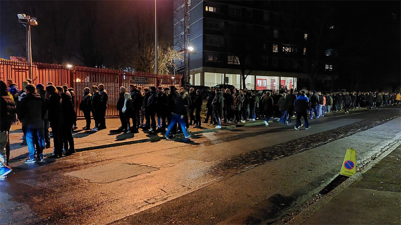 Brighton fans queue to collect tickets away at Charlton before the Carabao Cup fourth round game