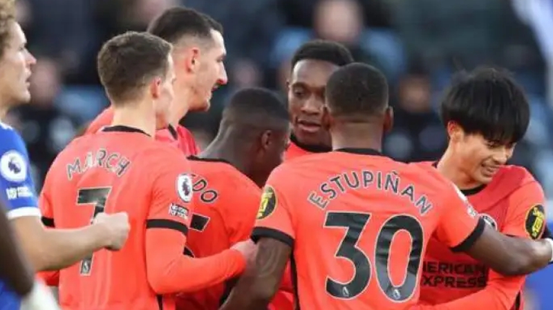 Brighton players celebrate scoring in their 2-2 draw away at Leicester City