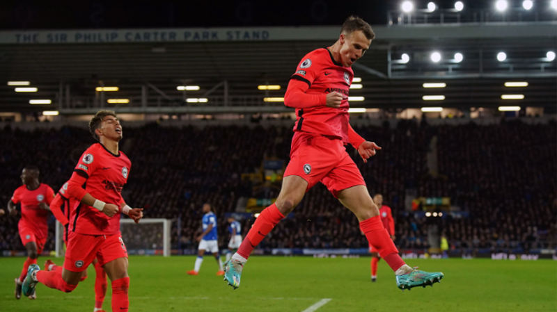 Solly March celebrates scoring for Brighton in their 4-1 win away at Everton