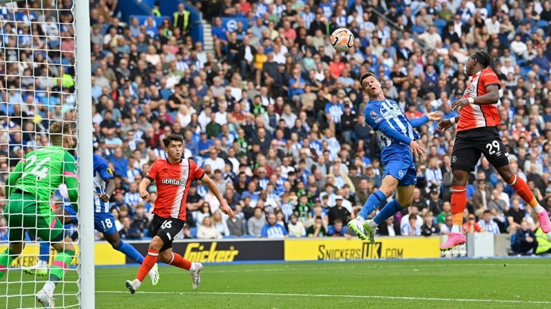 Solly March heads in the opening goal of the 2023-24 Premier Leaguye season for Brighton against Luton Town