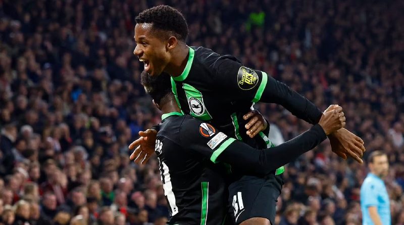 Ansu Fati and Simon Adingra celebrate Brighton scoring in their 2-0 win over Ajax