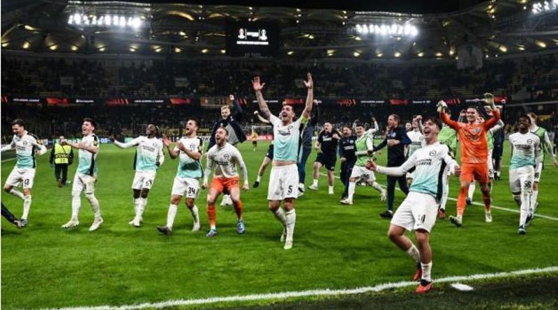 Brighton players celebrate their 1-0 win away against AEK Athens