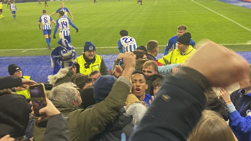 Joao Pedro celebrates his winning goal for Brighton against Marseille with Albion fans