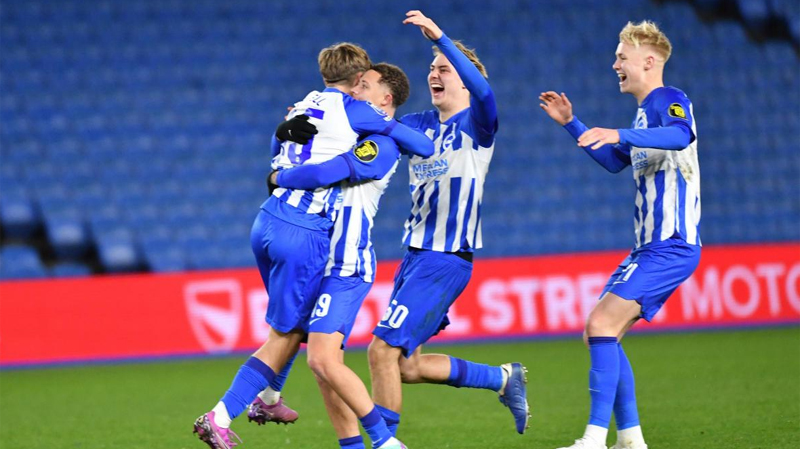 Brighton Under 21s celebrate beating Reading on penalties in the EFL Trophy