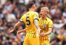 Jan Paul van Hecke and Lewis Dunk celebrate Brighton drawing 1-1 at Arsenal